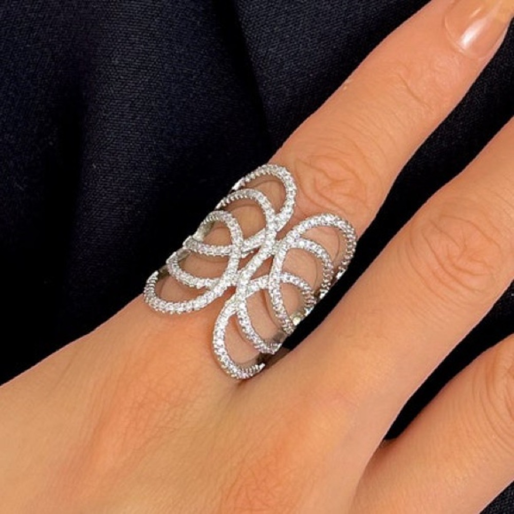 Round Cut Simulated Diamond Criss Cross Ring In 14K White Gold Plated Silver